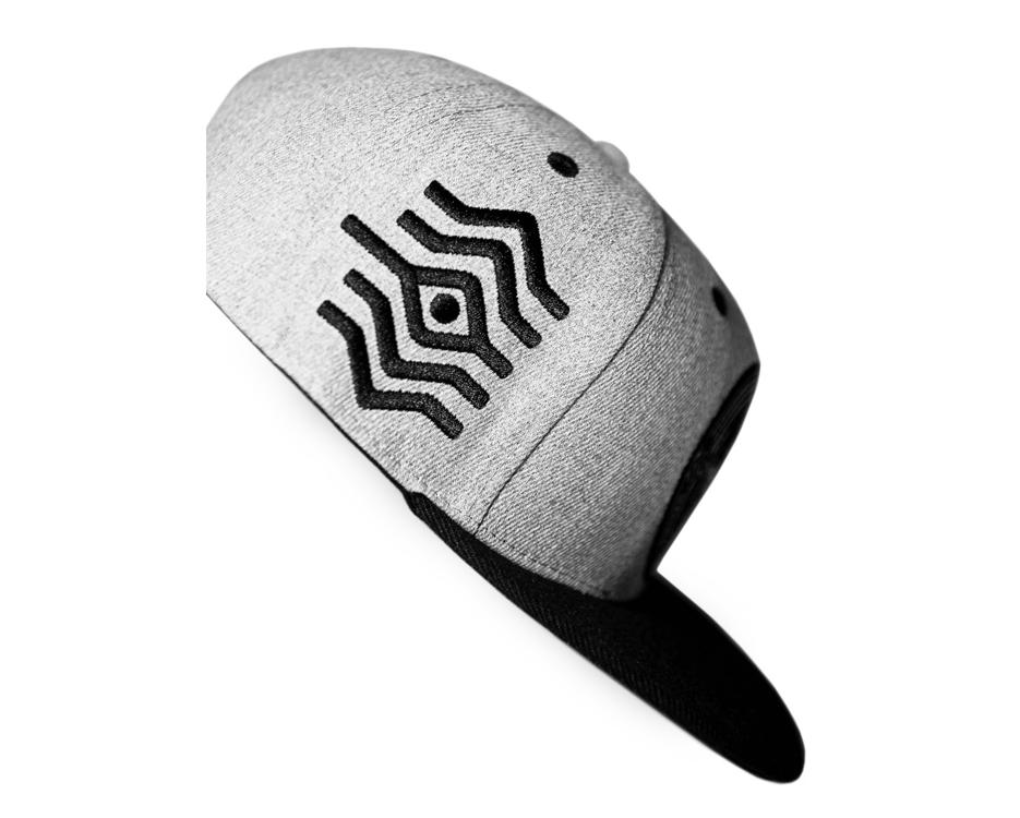 white hat with a 3rd eye design